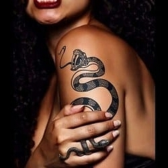 Значение, которое приписывается тату со змеёй